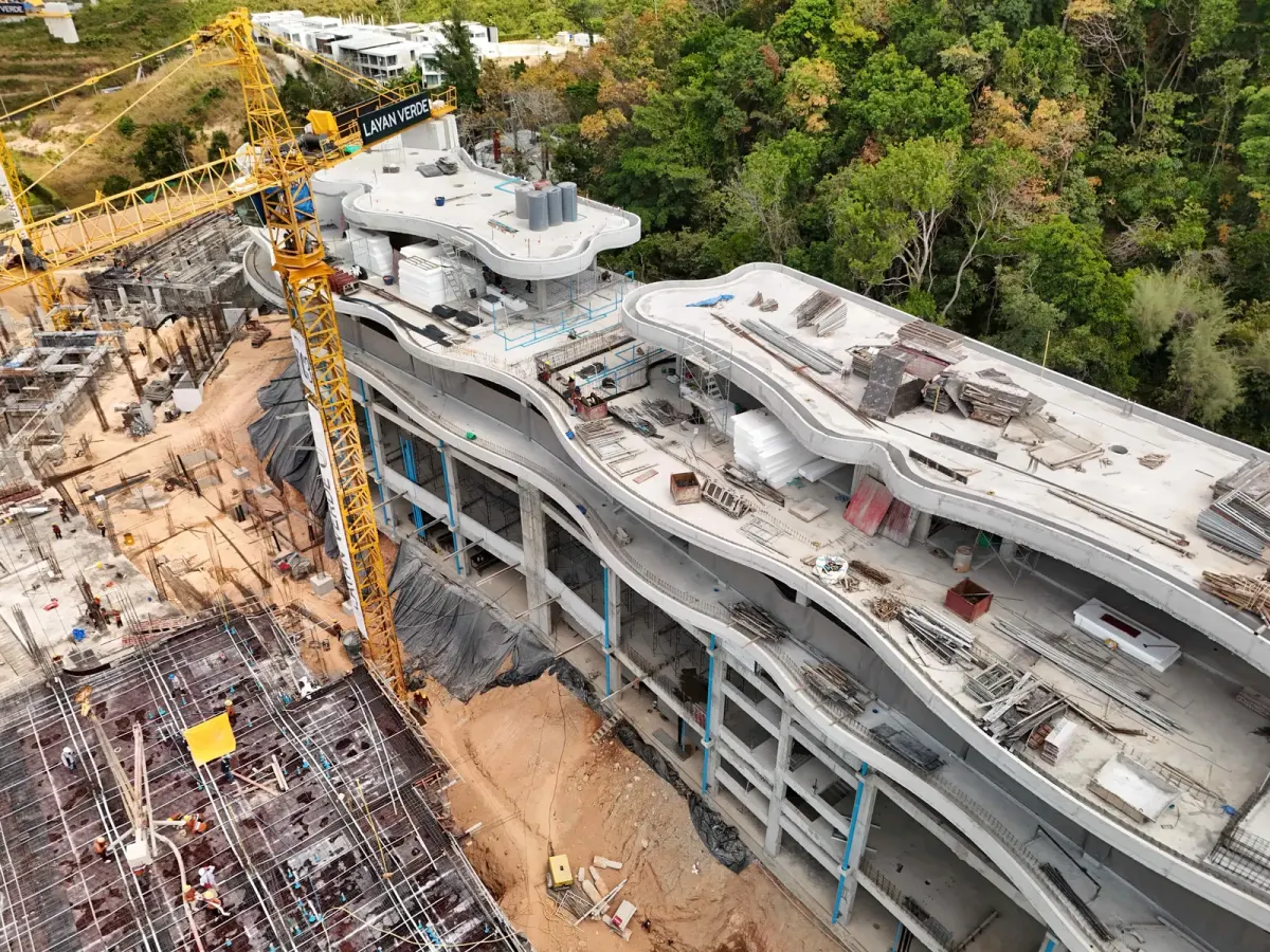 Construction progress on interior walls of a multi‑storey residential building in Phuket, Thailand Construction progress on interior walls of a multi‑storey residential building in Phuket, Thailand