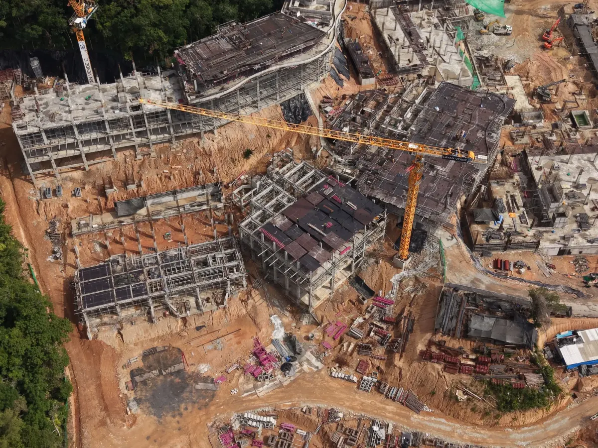 Construction site with vertical structures going up on the first floor of a Phuket residential building Construction site with vertical structures going up on the first floor of a Phuket residential building