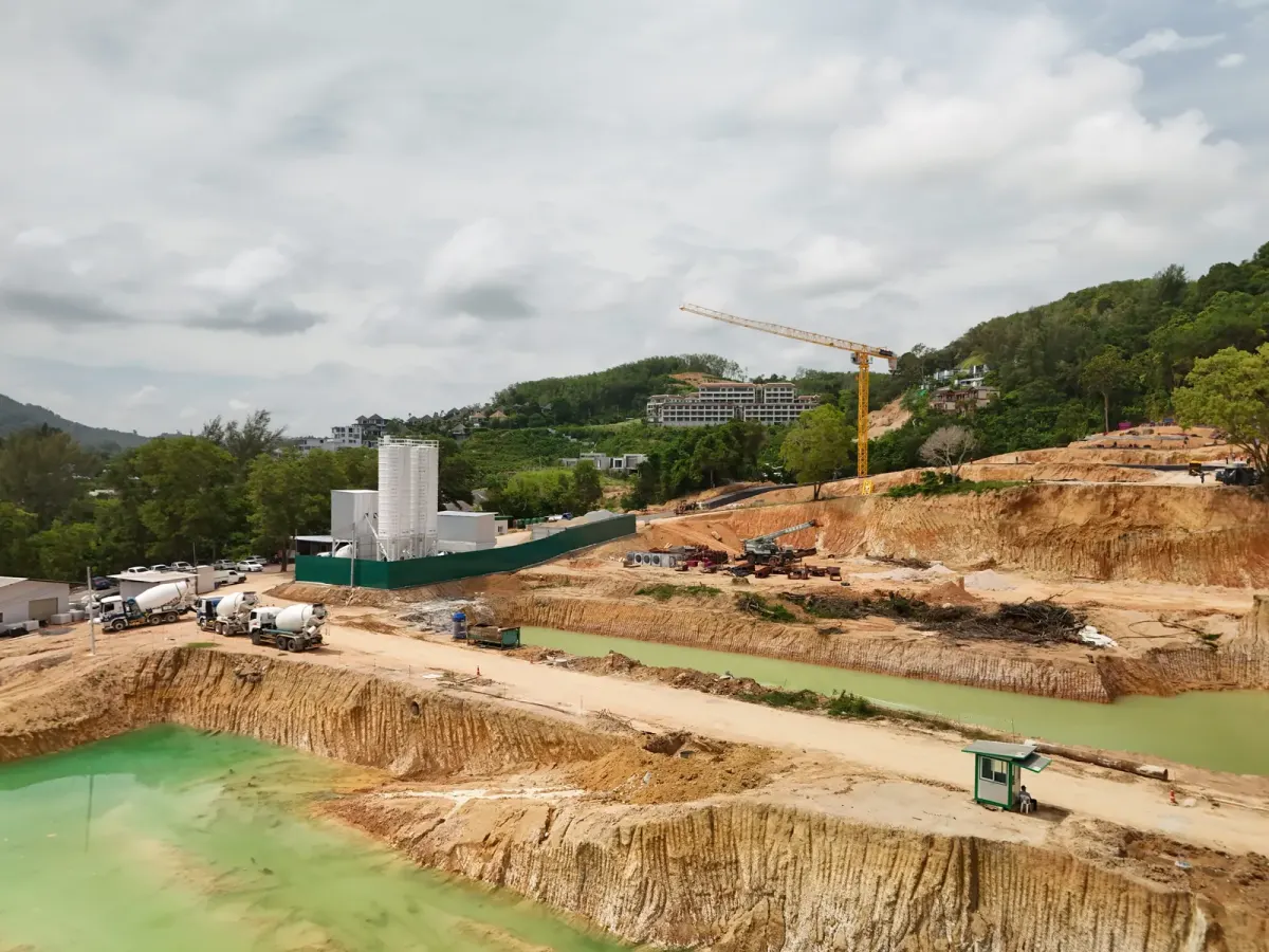 Construction site in Phuket showing temporary retention ponds prepared for the upcoming rainy season Construction site in Phuket showing temporary retention ponds prepared for the upcoming rainy season